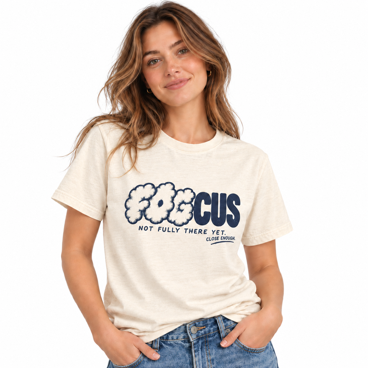Woman wearing the FOGCUS graphic tee in Faded Cream