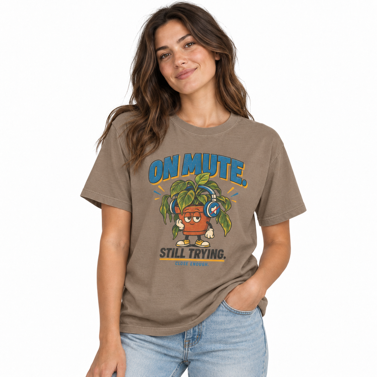 Woman wearing the ON MUTE tee in Faded Brown