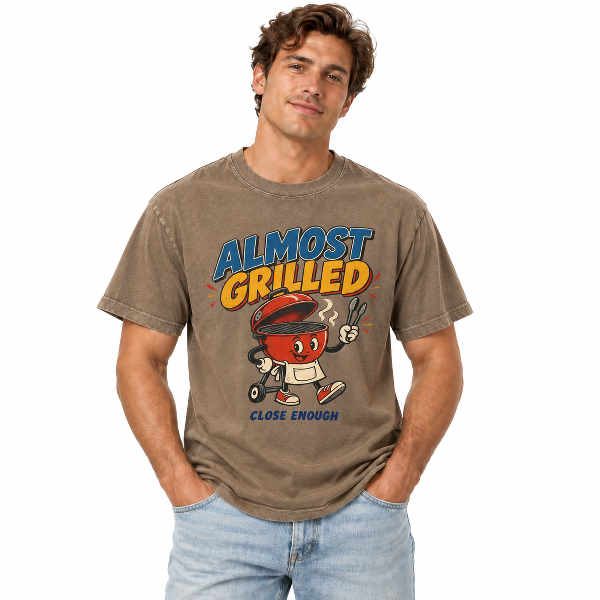 Man wearing the Almost Grilled graphic tee in Faded Brown