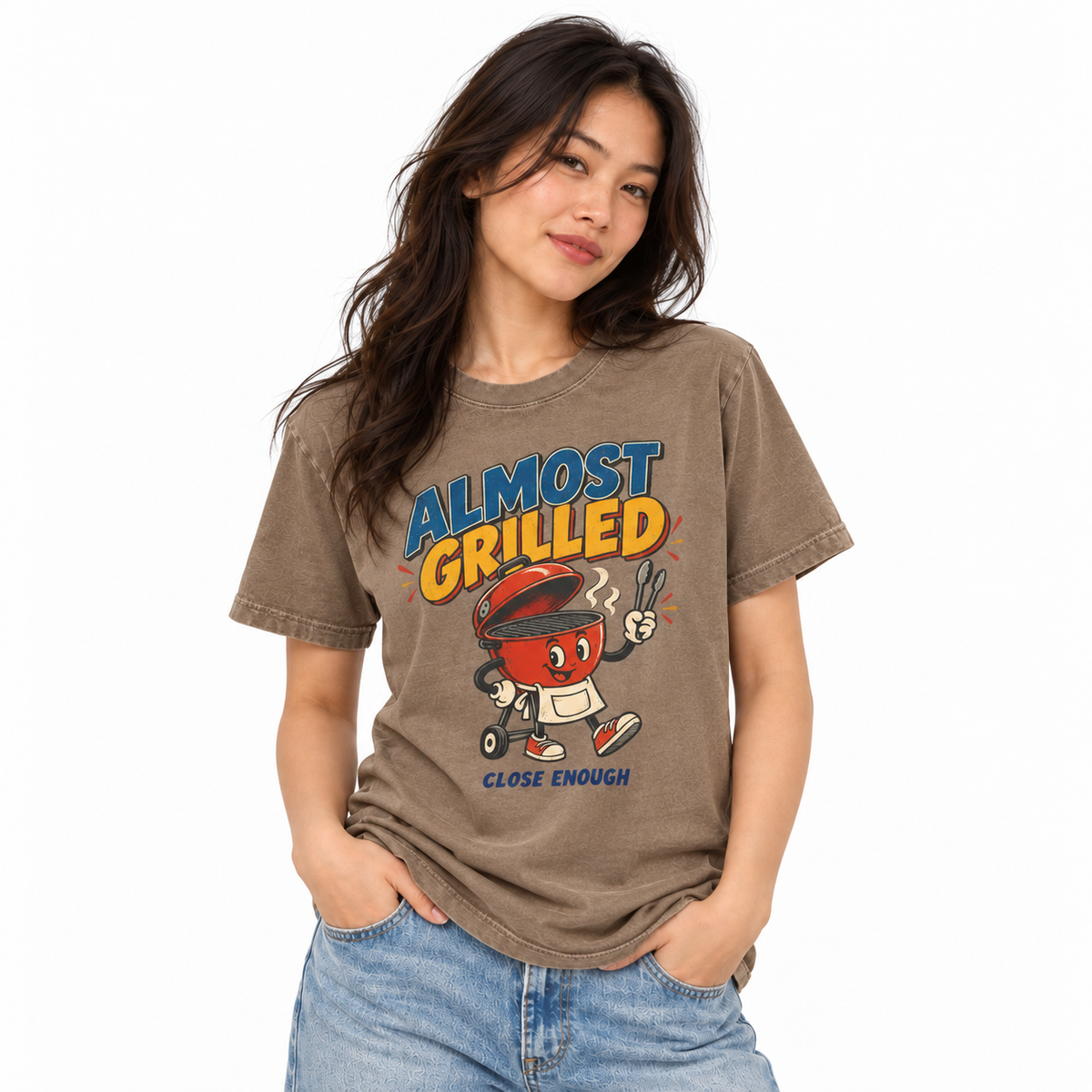 Woman wearing the Almost Grilled graphic tee in Faded Brown