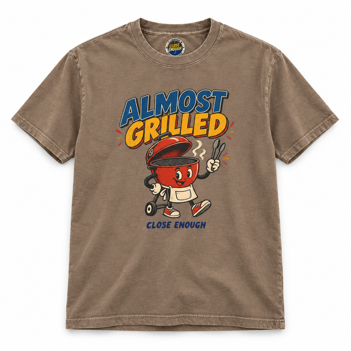 Almost Grilled graphic tee with retro BBQ grill character artwork in Faded Brown