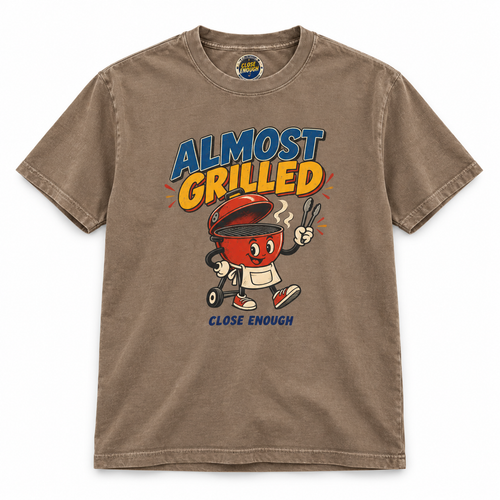 Almost Grilled graphic tee with retro BBQ grill character artwork in Faded Brown