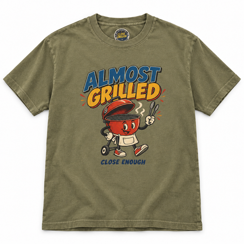 Almost Grilled graphic tee with retro BBQ grill character artwork in Faded Army