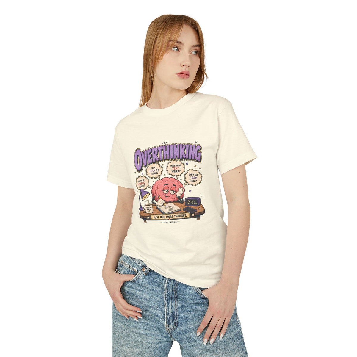 Woman wearing Overthinking at 2:47 graphic tee in Faded Cream