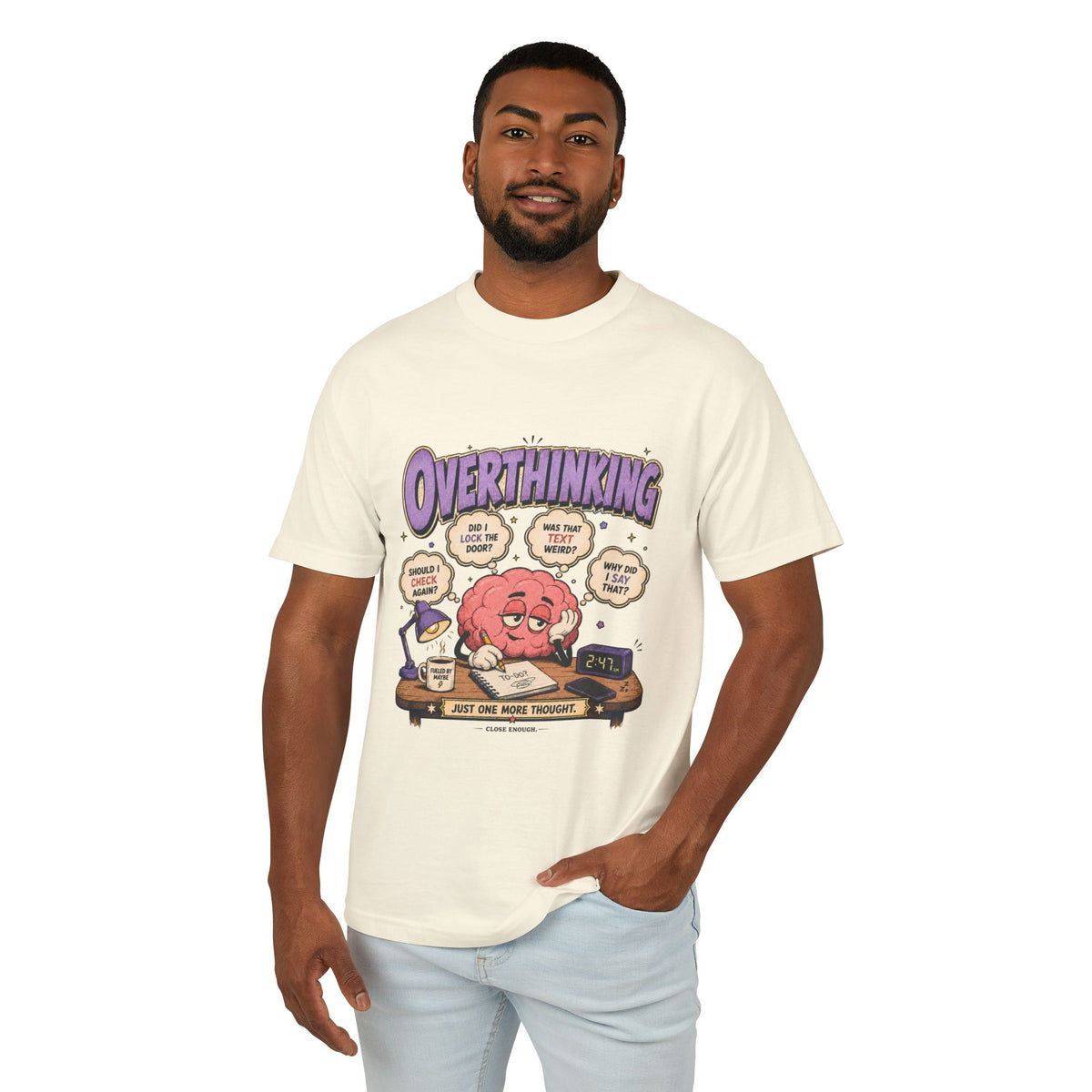 Man wearing Overthinking at 2:47 graphic tee in Faded Cream
