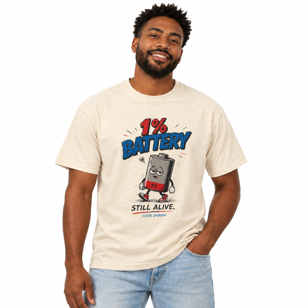 Man wearing 1% Battery graphic tee in Faded Cream