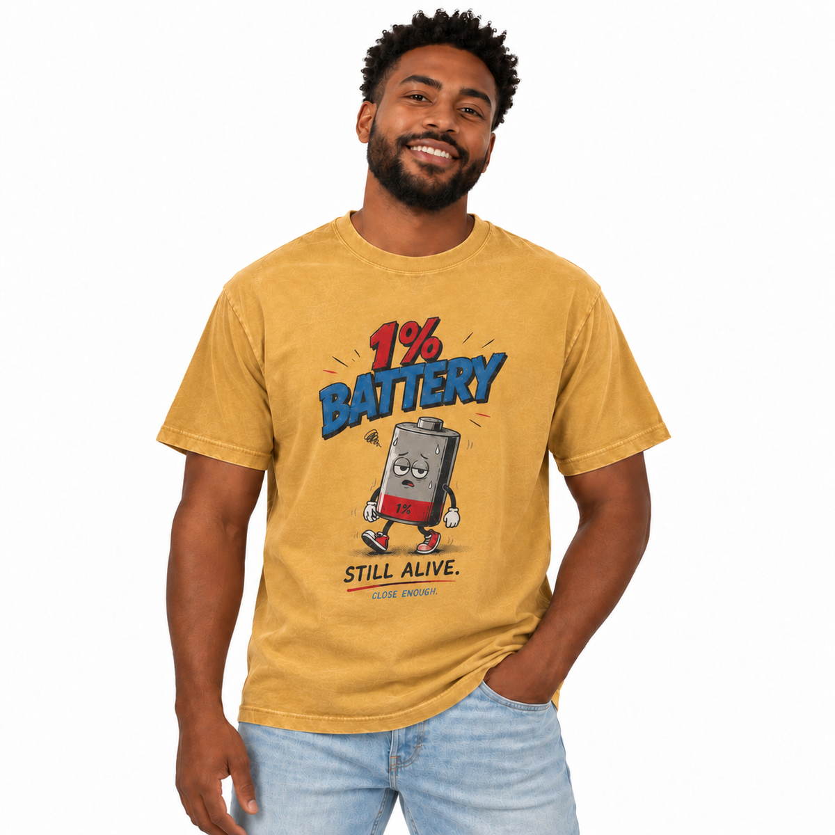 Man wearing 1% Battery graphic tee in Faded Mustard