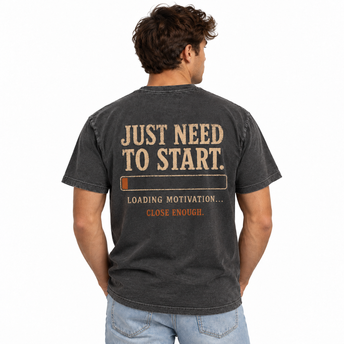Man wearing the Almost Ready Faded Black tee showing showing Just need to start back artwork