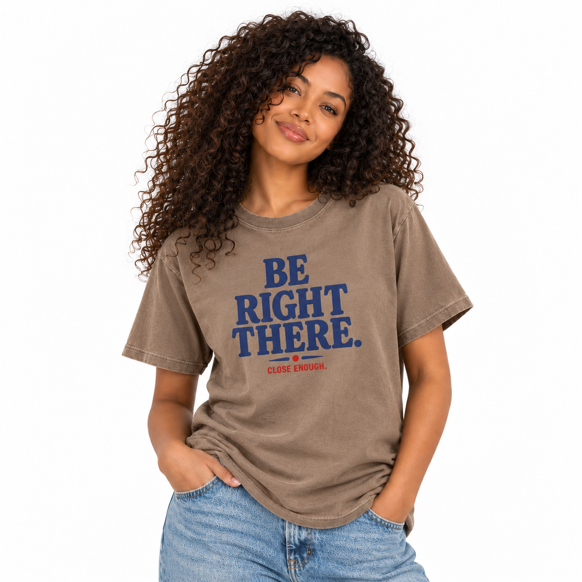Woman wearing the Be Right There faded brown graphic tee