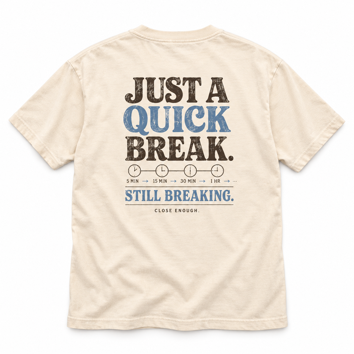 Back of BE RIGHT BACK cream tee with Just A Quick Break artwork