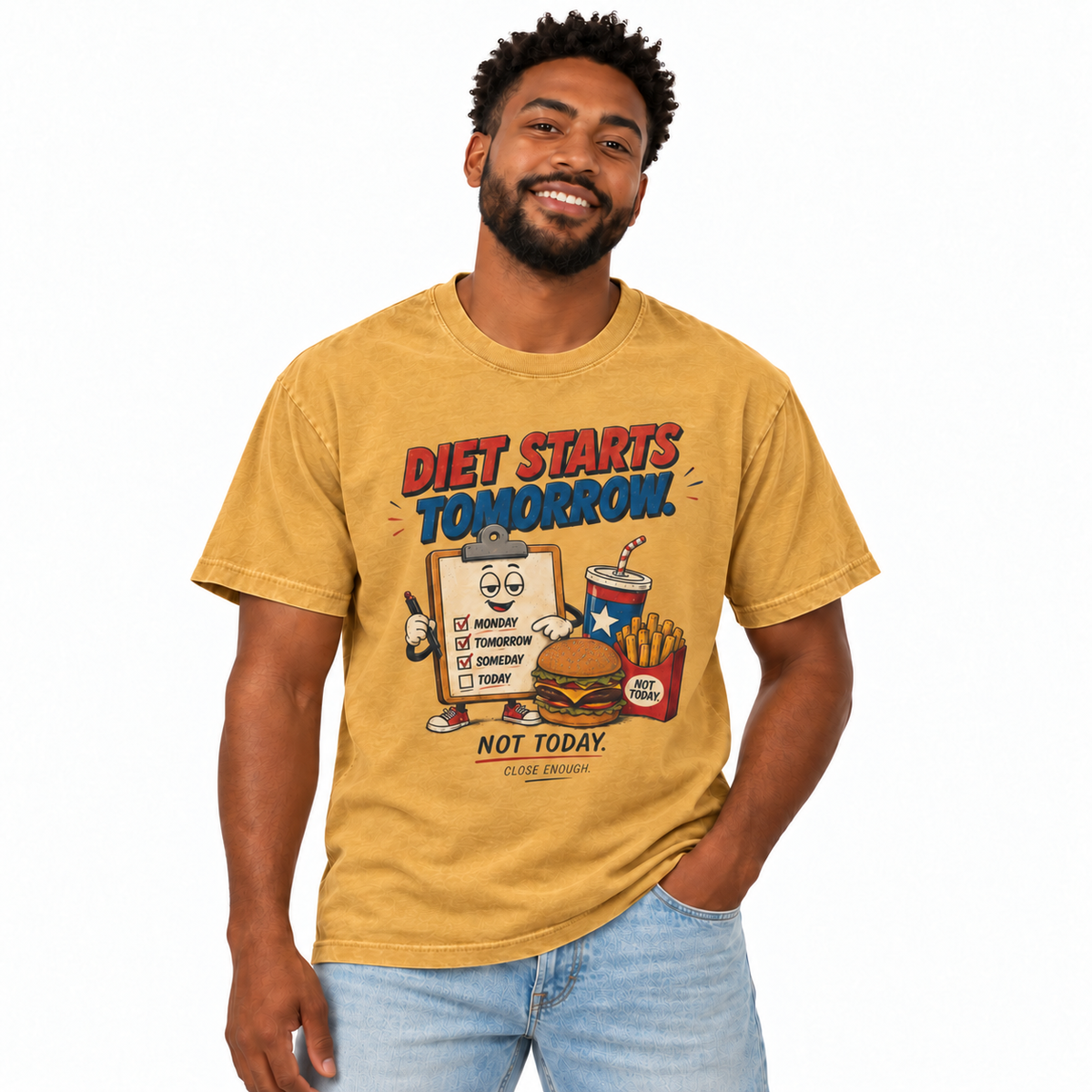 Man wearing the Diet Starts Tomorrow faded mustard graphic tee