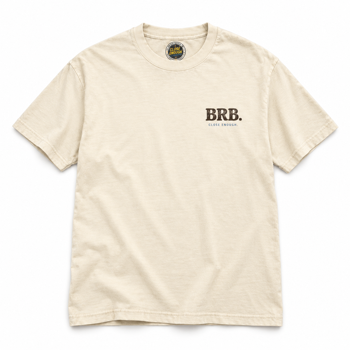 BE RIGHT BACK cream graphic tee with small front chest print