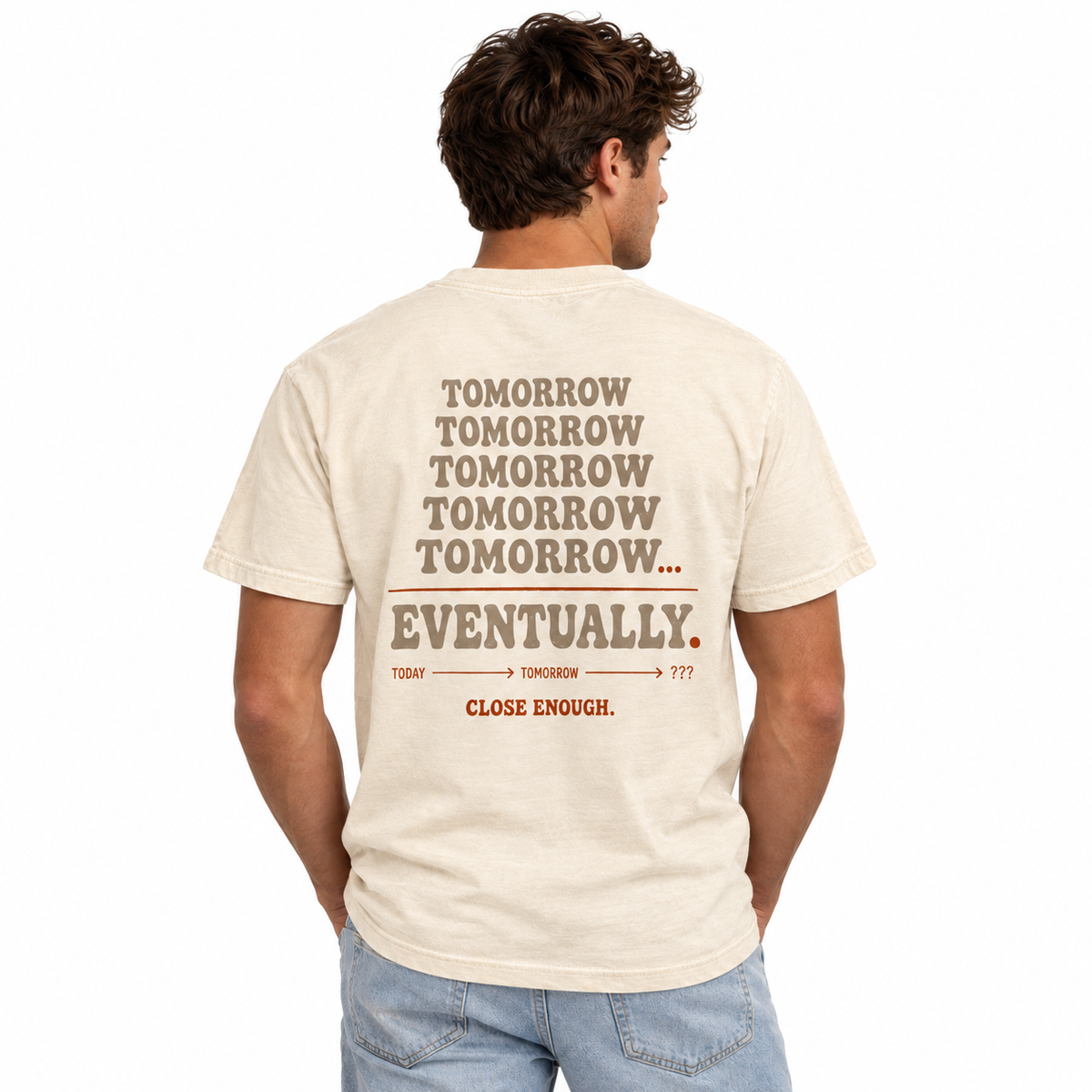Man wearing the I'll Do It Tomorrow cream tee showing back artwork
