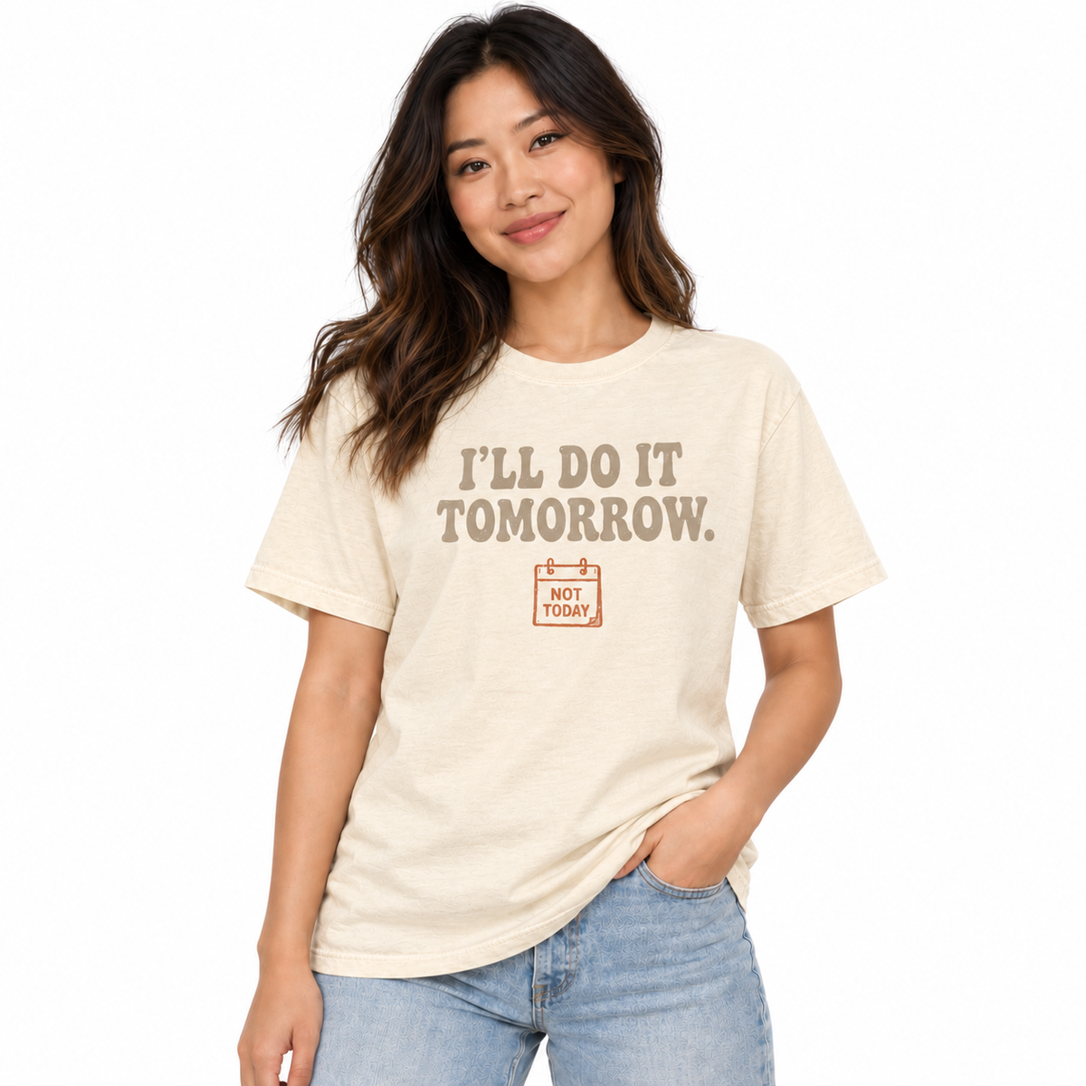 Woman wearing the I'll Do It Tomorrow cream graphic tee