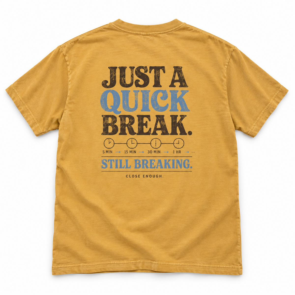 Back of BE RIGHT BACK faded mustard tee with Just A Quick Break artwork