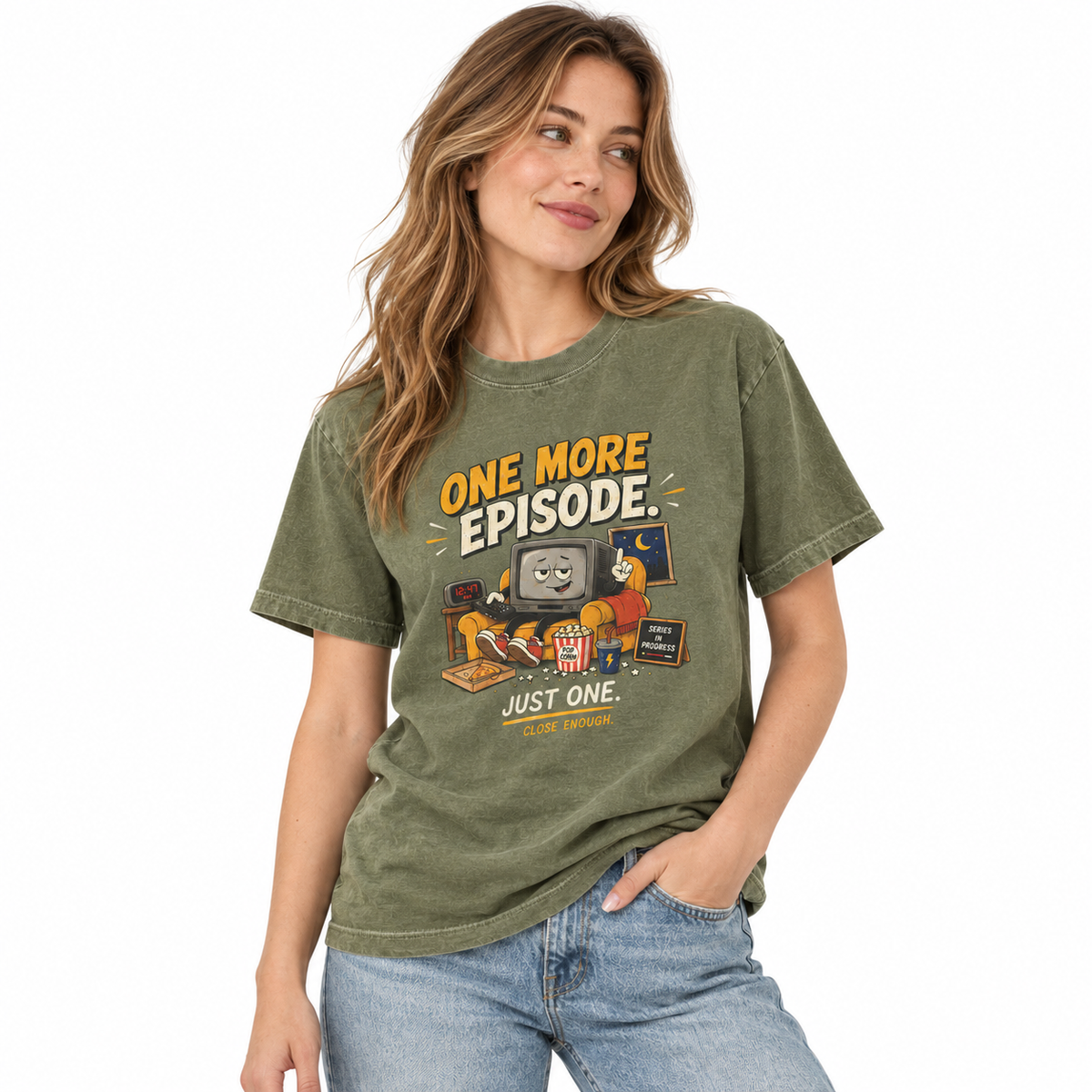 Woman wearing the ONE MORE EPISODE tee in Faded Army